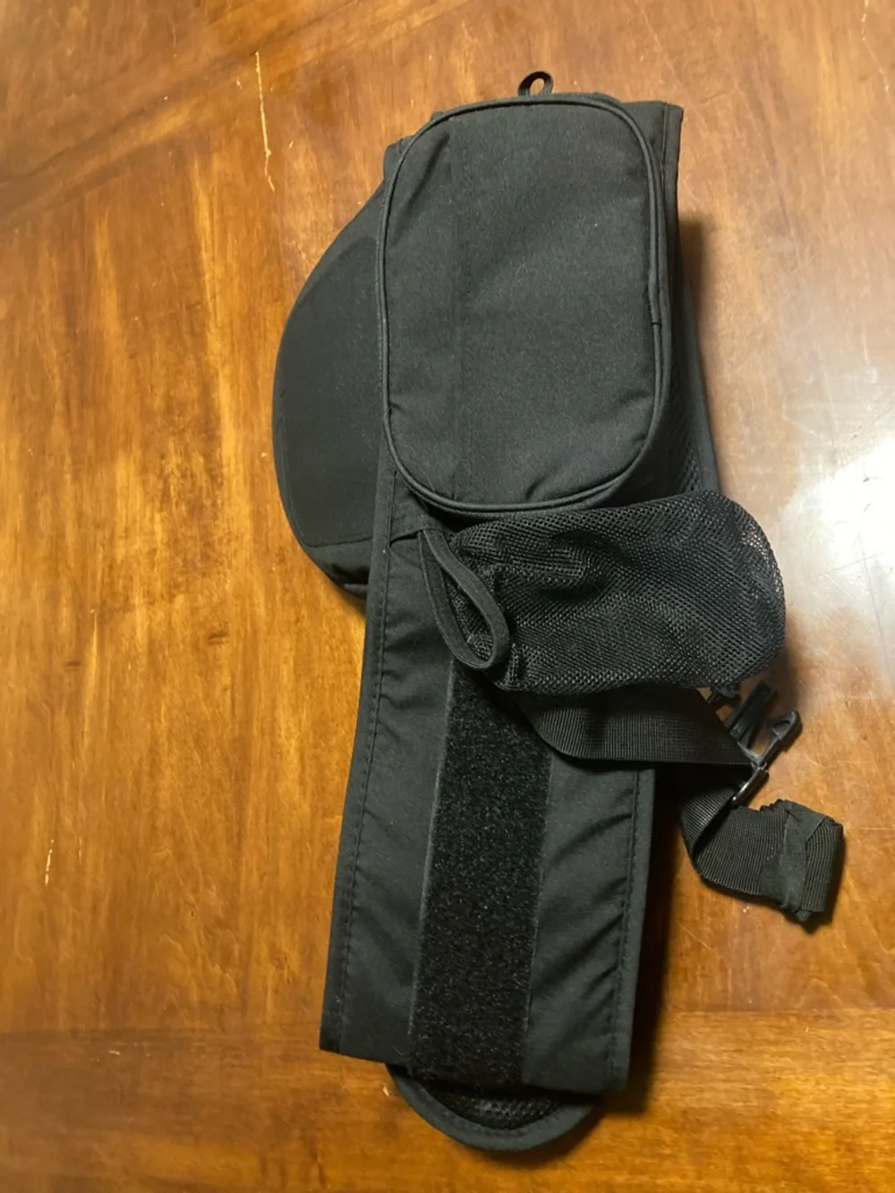 tushbaby Black Baby Sling Bag with Multiple Storage Pockets